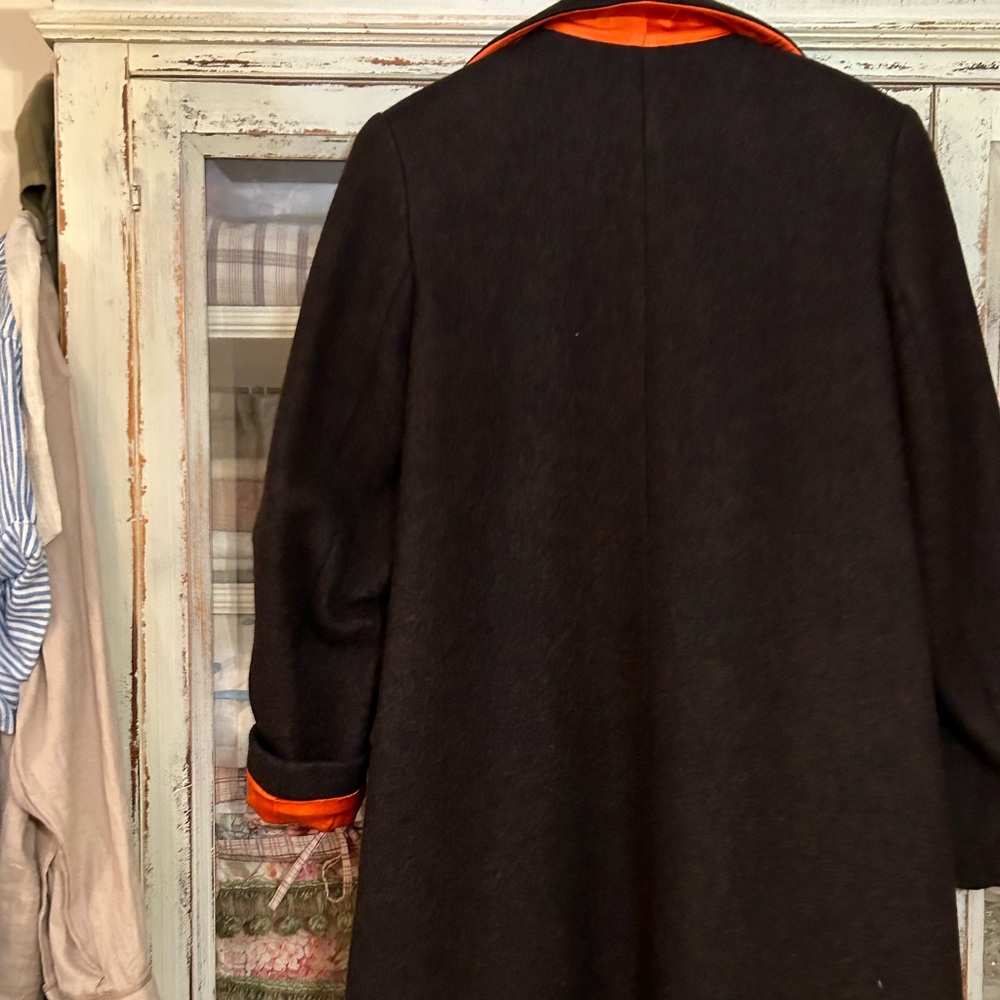 Gorgeous  dark brown wool long coat with flawless orange satin lining.
